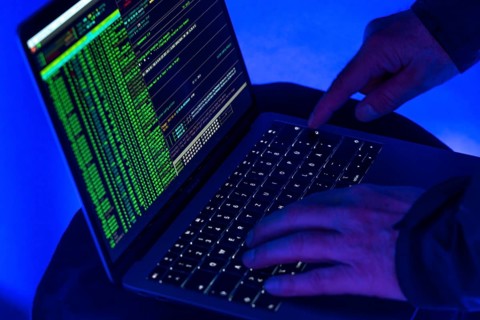 Symbolic image cyber attack, computer crime, cybercrime, computer hackers attack a network,