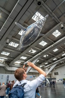 Mechanical flying objects, filled with helium, controlled by fine mechanics, movements copied from