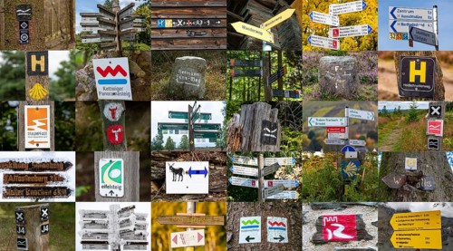 Collection of hiking signs, hiking trails, signposting of hiking tours, tour symbols mostly on
