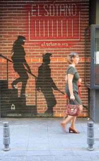 Spray painted artwork sign for El Sotano music club, Lavapies, Madrid city centre, Spain, Europe