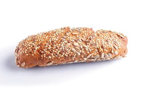 Rye bread with sunflower seeds, sesame and flax isolated on white. close up