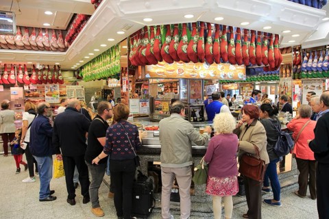 Customers inside a Museo del Jamon chain store shop in Madrid city centre, Spain, Europe
