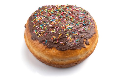 Homemade glazed and decorated chocolate easter pie isolated on a white background. Side view, close