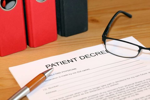 Symbolic image: Healthcare proxy, living will in English on a desk