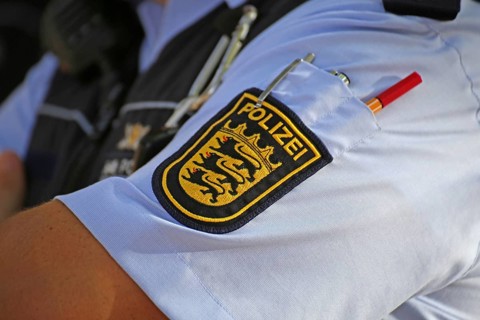 State coat of arms of Baden-Württemberg on the shirt of a policeman