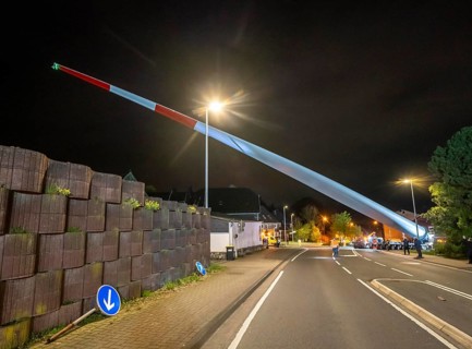 Transport of a 68 metre long, 22 tonne blade of a wind turbine, here in Schwelm, with a