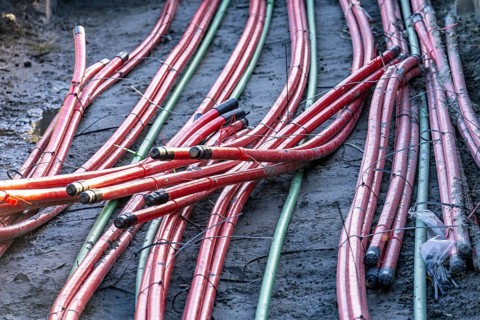 Power lines, underground cable strands that transport energy from wind turbines to central