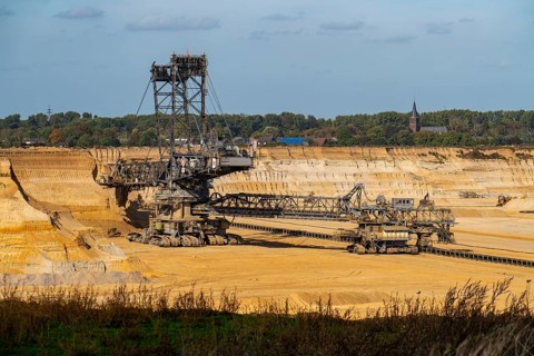 Opencast lignite mine Garzweiler II, bucket wheel excavator during excavation, at the edge of the