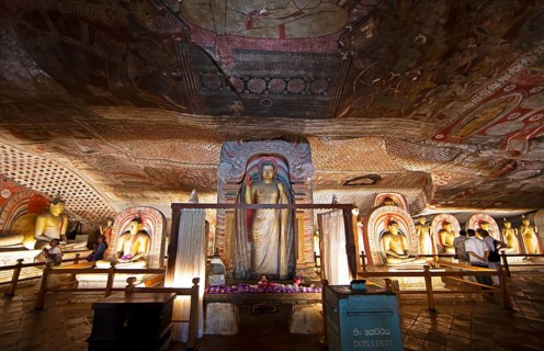 Buddha statues and ceiling fresco in the Dambulla cave temple, Dambulla, Central Province, Sri