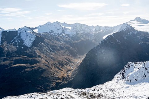 Mountain panorama with summit Hinterer Seelenkogel, mountain valley Langtal with mountain stream
