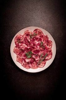 Sliced cured ham, prosciutto, italian dish, delicacy, parma ham, top view, no people