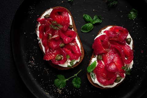 Sandwiches with gravlax salmon, cream cheese, capers, greens, breakfast, homemade