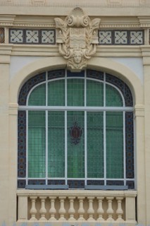 Window with decorations on Villa Caisse d'Epargne, stained glass window, parapet,
