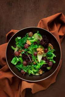Fresh salad, waldorf, celery stalk, with apple and walnut, grapes, herbs, homemade, no people