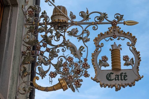 Wrought iron nose plate of a confectionery, Rottweil, Baden-Württemberg, Germany, Europe