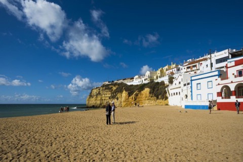 Beach and colourful houses, Carvoeiro, Algarve, Portugal, Europe