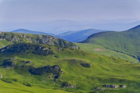 View of the mountains of the Transylvanian Alps in the southern Carpathians from a height in the