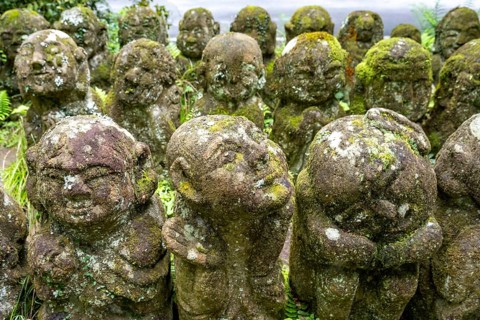 Moss-covered stone statues of rakans, the disciples of Buddha, Otagi Nenbutsu-ji temple, Kyoto,