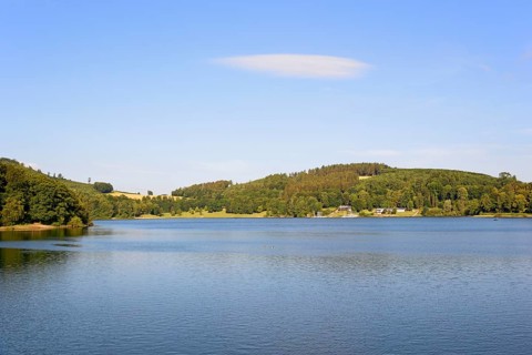 View over the Hennesee, blue sky with a cloud, Hennetalsperre, Naturpark Sauerland-Rothaargebirge,