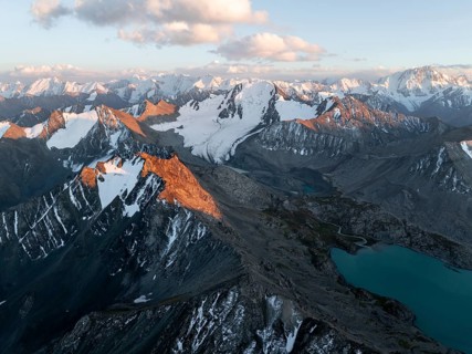 Evening mood, mountain panorama, aerial view, 4000 metre peak with glacier, mountain pass and
