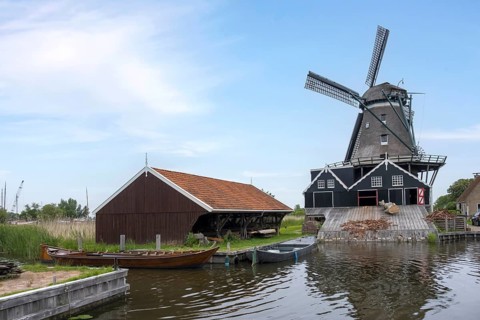 Windmill De Rat on the river Geeuw, wooden sawmill, Ijlst, province of Friesland, Netherlands
