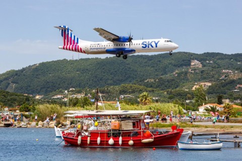 An ATR 72-600 Sky Express aircraft with the registration SX-NTE at Skiathos Airport, Greece, Europe