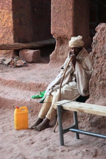 Rock churches of Lalibela, pilgrims in front of the entrance to Bete Maskal, Chapel of the Cross,