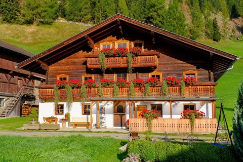 Old farmhouses in Grossdorf near Kals am Großglockner, East Tyrol, Austria, Europe