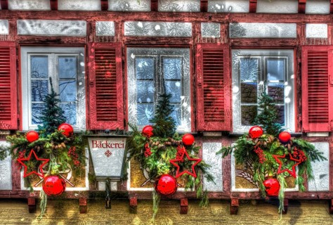 House facade with Christmas decoration, window, window shutters, half-timbered, Christmas motif,