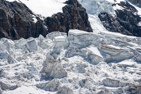 Rutted glacier ice with crevasses, high alpine mountain landscape, La Jonction, Chamonix,
