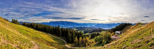 Panoramic view over hilly landscape with mountains and forest, Spitzstein