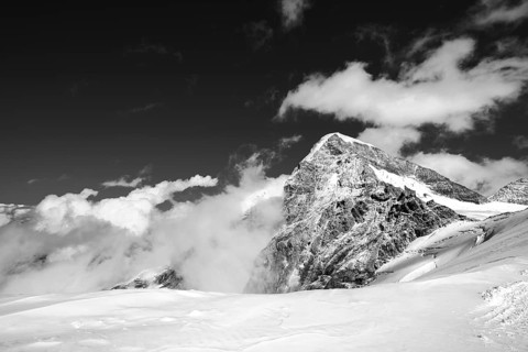 Snow mountains, the Swiss alps, Jungfrau Joch and glacier in black and white landscape.