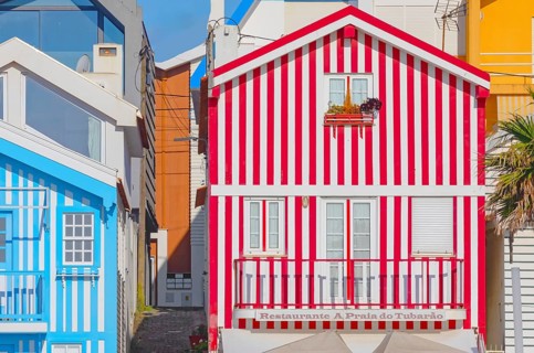 Brightly painted beach homes, Costa Nova do Prado, Aveiro, Portugal, Europe