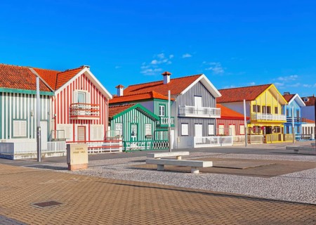 Brightly painted beach homes, Costa Nova do Prado, Aveiro, Portugal, Europe