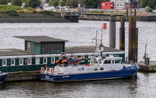 Ships, sailors and launches in Hamburg harbour at the Speicherstadt, Hamburg, Germany, Europe