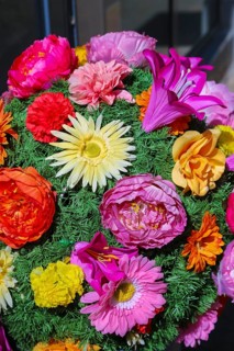 Fabric flowers in front of shop, artificial flowers, colourful textile flowers, Reutlingen,
