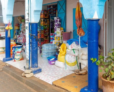 Historic buildings shop in arcaded shopping street in town centre, Mirleft, southern Morocco, North