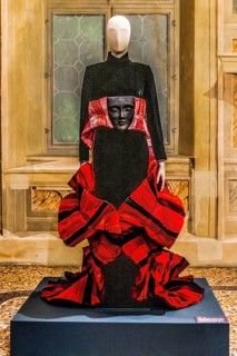 Sculpture in black viscose velvet and folded red taffeta with fibreglass mask, wrapped in silk