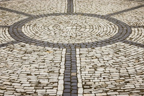 Detailed view of a rosette of white cobblestones at St Laurentius Church in Warendorf, Warendorf