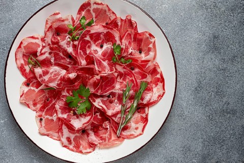 Sliced cured ham, prosciutto, italian dish, delicacy, parma ham, top view, no people