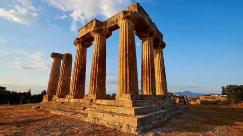 Archaic Temple of Apollo, Doric columns, Partially preserved ancient temple with columns against a