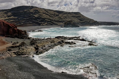 Lava rocks at the Playa de los Ciclos near the Green Lake, Lago Verde, El Golfo, Lanzarote, Canary