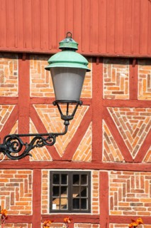 Old street lamp at a half timbered wall in Ystad, Skåne County, Sweden, Scandinavia, Europe