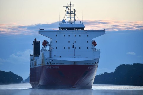 RoRo cargo ship Super Fast Levante travelling through the Kiel Canal at sunrise, Kiel Canal,