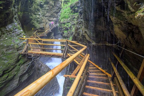 Water falls down on the climbing facility in the Raggaschlucht gorge, Flattach, Carinthia, Austria,