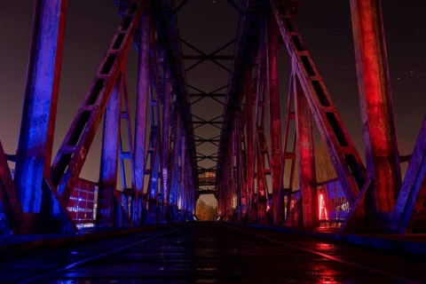 Illuminated steel structure of the heritage-protected lift bridge, Magdeburg, Saxony-Anhalt,