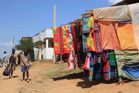 South Ethiopia, market in Jinka, locals in front of a market stall, market scene, Ethiopia, Africa