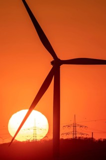 Emschergenossenschaft wind turbine, view to the west, in Essen, sunset, North Rhine-Westphalia,