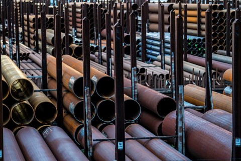 Warehouse for steel pipes in Duisburg harbour, steel pipes in various diameters, North