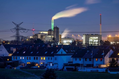 Chimney of the residual waste incineration plant AVG, Fordwerke in Niehl, residential area in